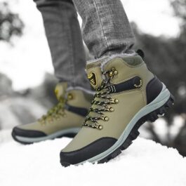 A pair of beige Winter Snow Boots for Men on snowy ground.