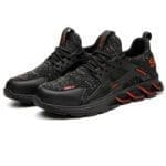 Black and orange men's sneakers designed for labor, featuring a protective toe for safety and comfort on the job.