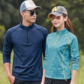 people wearing Couple warm yoga apparel. The person on the left is wearing a blue shirt, and the person on the right is wearing a teal shirt.