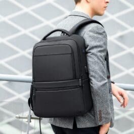 Stylish Men’s Large Capacity Business Travel Backpack in Gray with Adjustable Strap and Side Pocket.