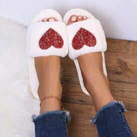 Love Sequin Slippers featuring heart-shaped designs, perfect for adding a touch of charm and comfort to your footwear collection.