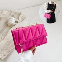 Bright pink Fashion Chain Crossbody Shoulder Bag with geometric quilted design, showcased against a soft white background, creating a striking contrast that highlights the bag’s vibrant color and trendy style.