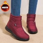 Ankle Boots for Women in burgundy with zipper detail, worn with blue jeans, showcasing a stylish and comfortable design suitable for casual wear.