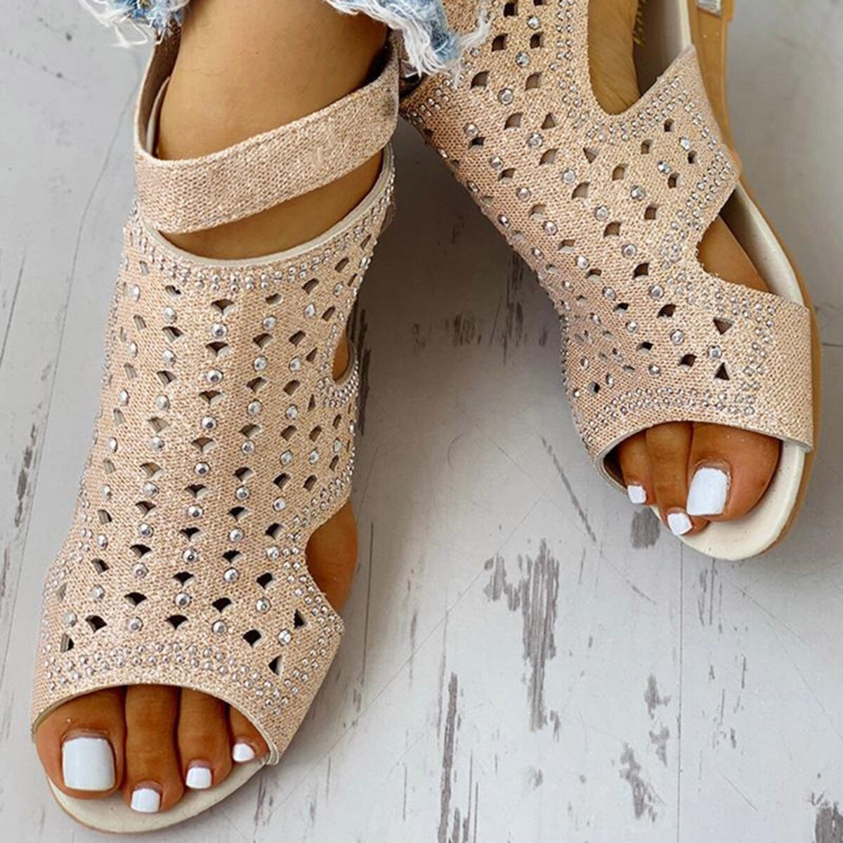 <ul> <li><strong>Glamorous Rhinestone Detail:</strong> Sparkles with every step.</li> <li><strong>Peep-Toe Design:</strong> Keeps your feet cool and stylish.</li> <li><strong>Back Zip Closure:</strong> Easy to put on and remove.</li> <li><strong>Flexible PU Material:</strong> Comfortable and durable for all-day wear.</li> <li><strong>Available in Three Colors:</strong> Black, Beige, Gold.</li> </ul>