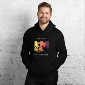 Versatile Unisex Hoodie worn by a model against a textured grey background, showcasing the adaptable fashion suitable for any gender.